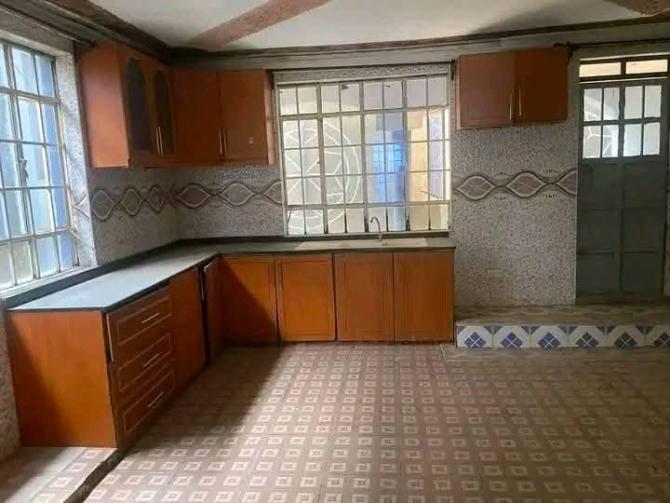 renting--Townhouse_Address-Kangemi_Market__Nairobi__Kenya_price-15000_Beds-4_Baths-1-52-0